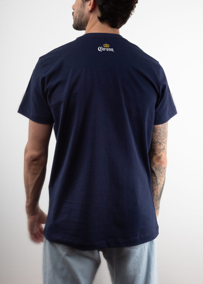 Camiseta Tradicional Azul "This is Living" Corona [PACK 50 UNIDADES]